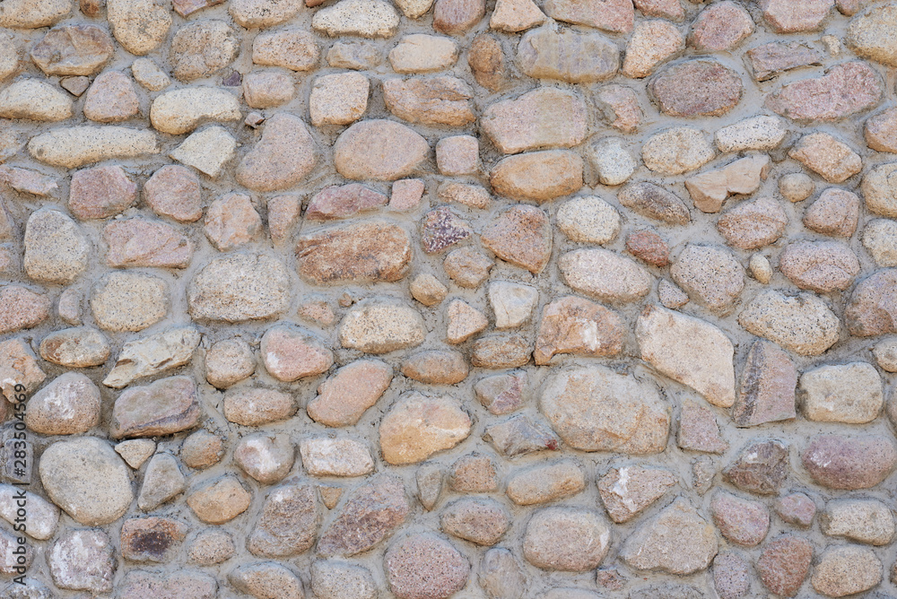 Masonry wall of a stones, pattern texture background Masonry wall of a stones, pattern texture background