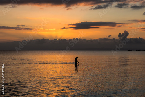 early morning swim at sunrise © 1514 Images