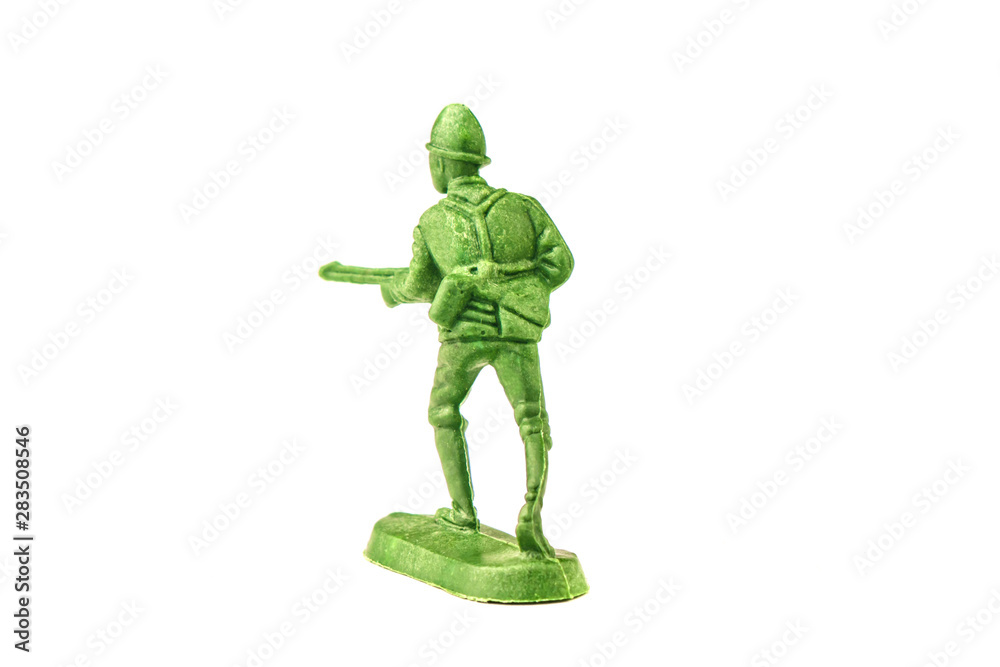 miniature toy soldier on white background, close-up miniature toy soldier on white background, close-up