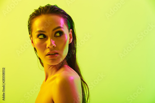 Beauty portrait of an attractive topless young asian woman
