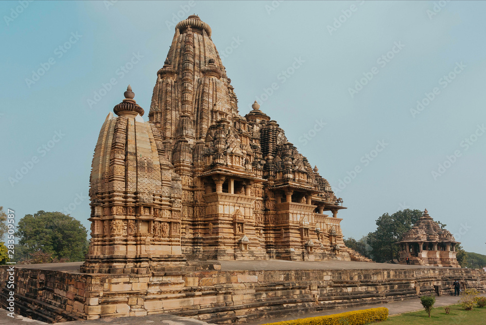 Famous Hindu temples in Khajuraho with reliefs and ancient sculptors on ...