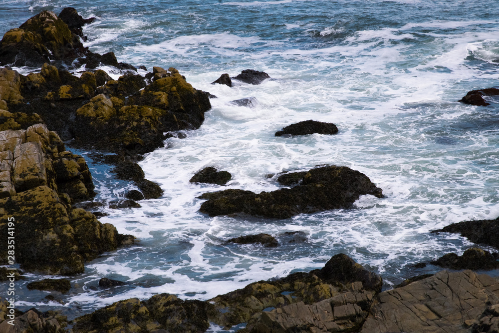 waves on rocks