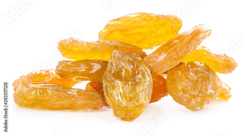 Yellow raisins isolated on white background