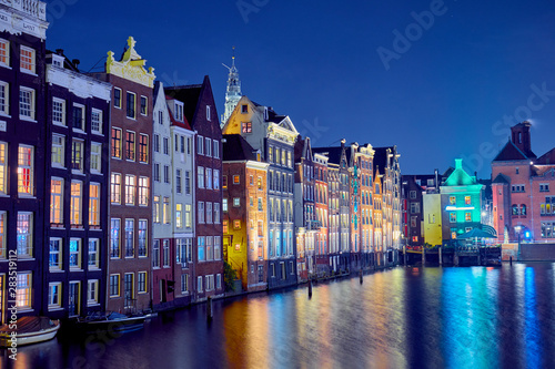 Photography Night cityscape in Amsterdam with old brick houses