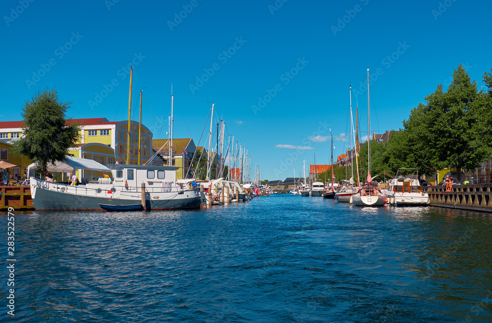 Canal with boats, ships and yachts in Copenhagen