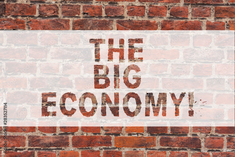 Handwriting text writing The Big Economy. Concept meaning Global finances Worldwide Market Trade Money exchange Brick Wall art like Graffiti motivational call written on the wall Handwriting text writing The Big Economy. Concept meaning Global finances Worldwide Market Trade Money exchange Brick Wall art like Graffiti motivational call written on the wall