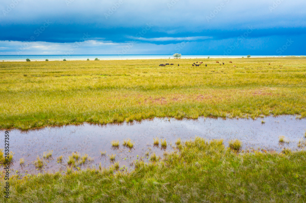 layers of water and sky on natural foreland in Black Sea in Ukraine