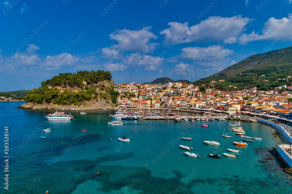 Aerial cityscape view of the coastal city of Parga, Greece during the Summer