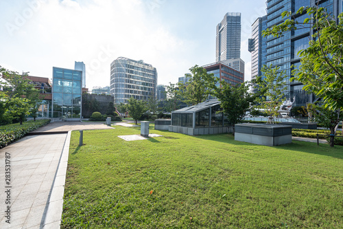 Photography green lawn with city skyline in shanghai china