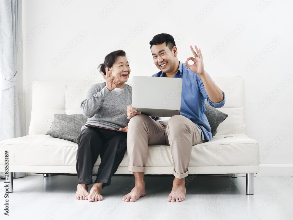 Asian agent man deal with senior for life insurance contract signed, business concept. Asian agent man deal with senior for life insurance contract signed, business concept.