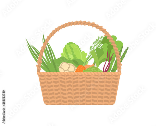 Fresh organic vegetables in wicker basket isolated on white background