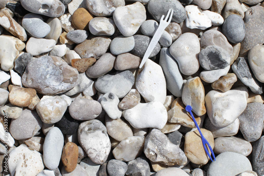 disposable plastic human food waste on the beach against environment disposable plastic human food waste on the beach against environment