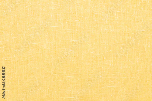 Yellow linen pastel fabric, background or texture
