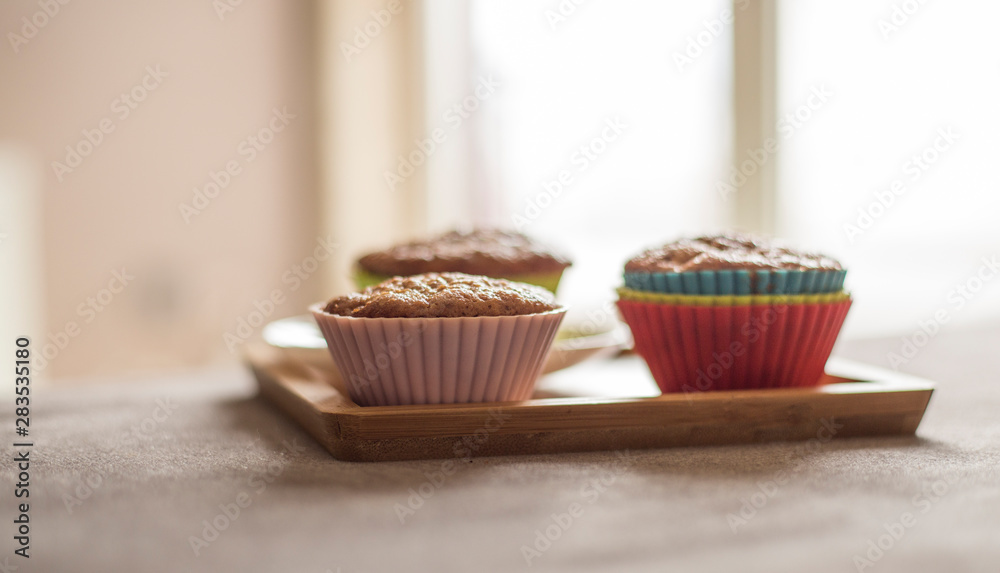 Close up muffin in colourfull cups Close up muffin in colourfull cups