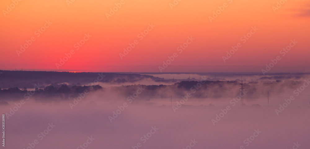 Sunrise on misty valley Sunrise on misty valley