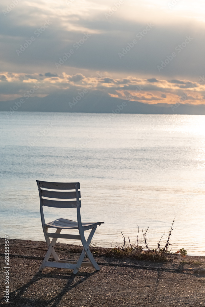 Sunset, sea and chair Sunset, sea and chair
