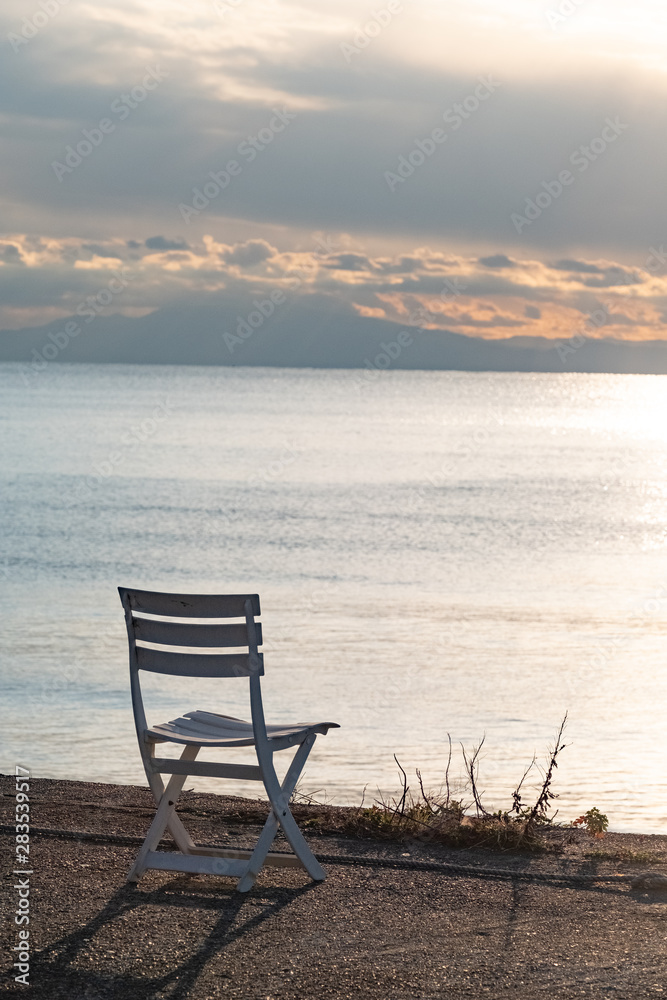 Sunset, sea and chair