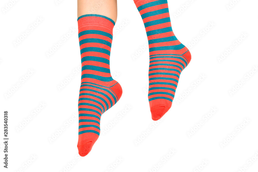 Woman in orange socks isolated on white background. Top view. Woman in orange socks isolated on white background. Top view.