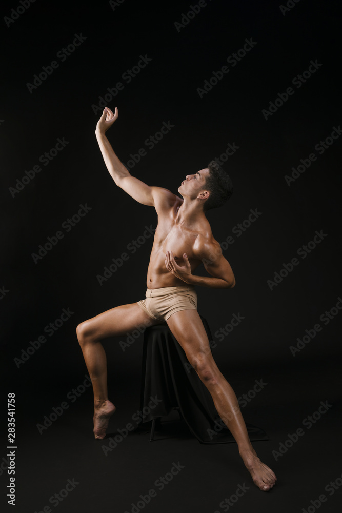 Naked man spreading legs and hands to sides Naked man spreading legs and hands to sides