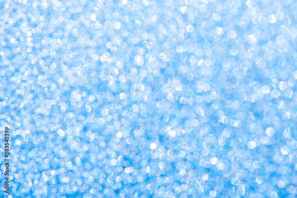 Abstract beautiful background of blue sparkles for festive design