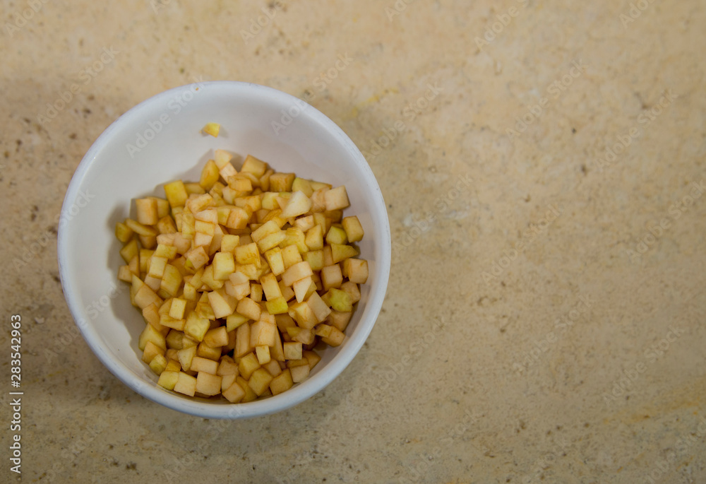 Apple on white plate, ingredient of 