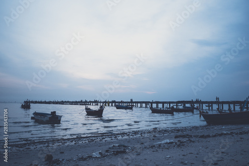 local fishing boat and the sea sunset