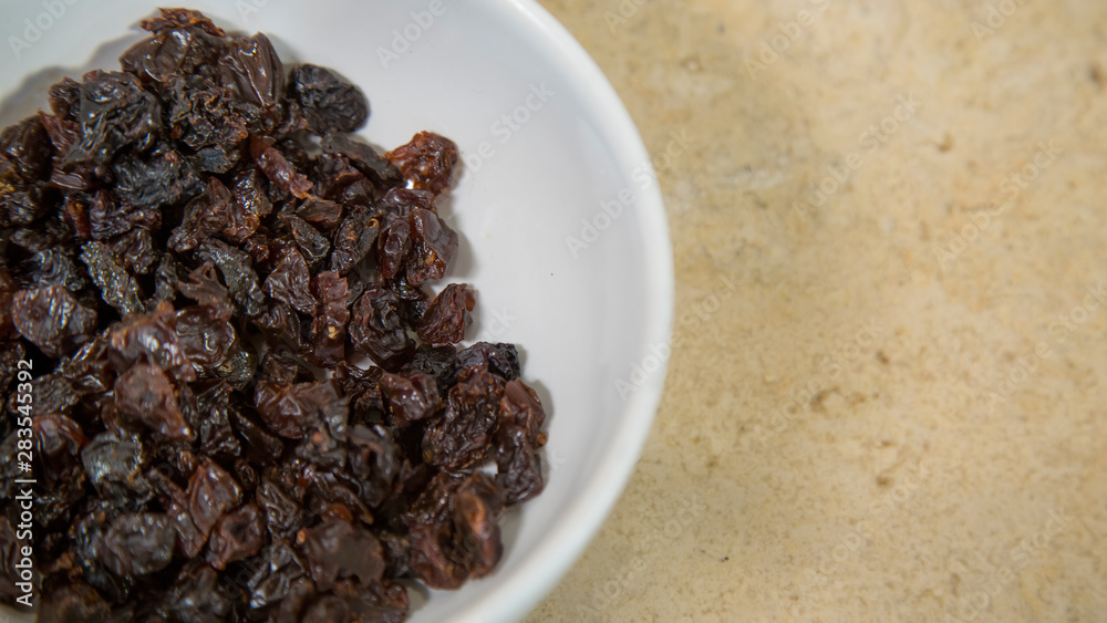 raisins on white plate, ingredient of raisins on white plate, ingredient of
