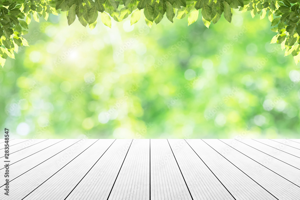Empty wooden table with party in garden background blurred. Empty wooden table with party in garden background blurred.