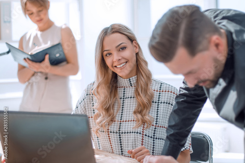 young business woman sitting at office Desk