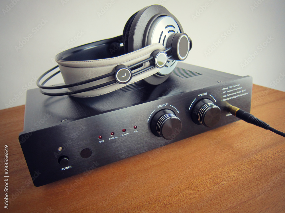 Black DAC Headphone amplifier with connected headphones Stock Photo ...