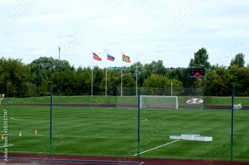 soccer field with the flags of Russia and Tatarstan