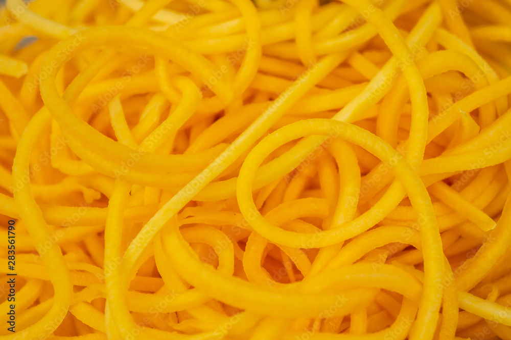 Close up of butternut squash noodles texture Close up of butternut squash noodles texture