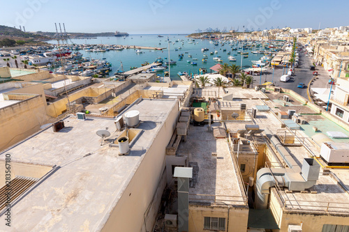Marsaxlokk. Traditional boats Luzzu in the old harbor. photo