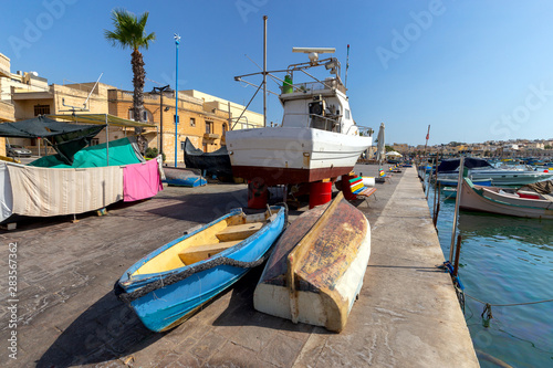 Marsaxlokk. Traditional boats Luzzu in the old harbor. photo