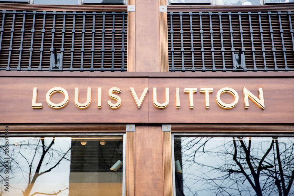 View at Louis Vuitton shop in Paris, France. Louis Vuitton is French  fashion house founded in 1854 and one of the world's leading  international fashion houses Stock Photo