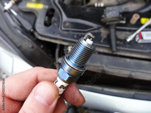 replacing spark plugs on a car