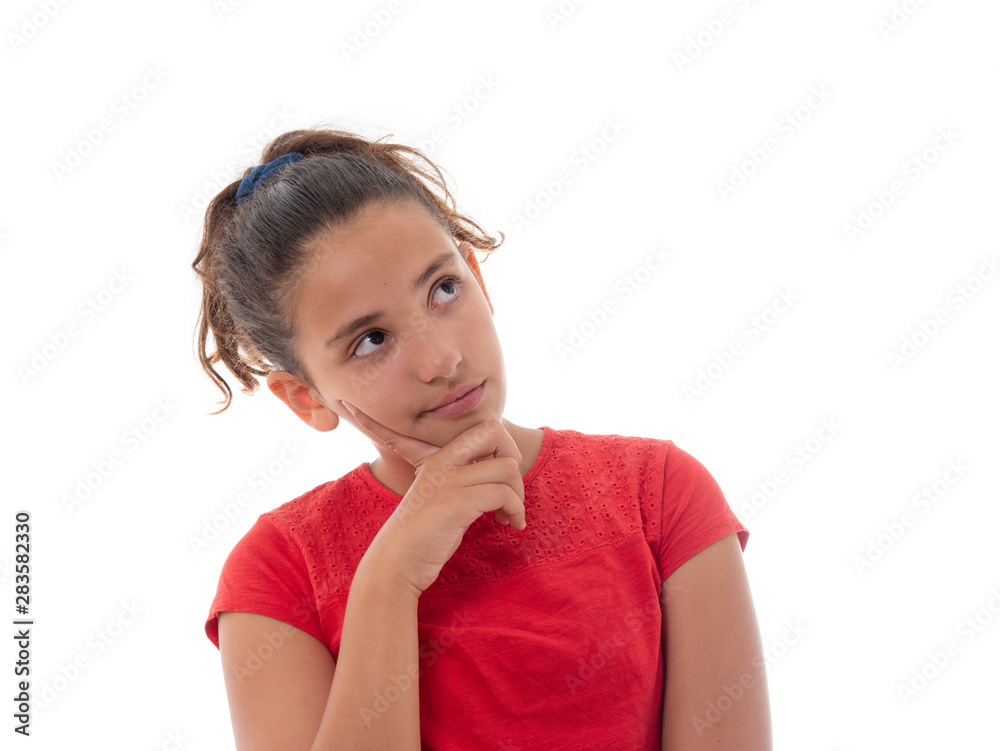 indoor portrait of a thoughtful young girl isolated on white background