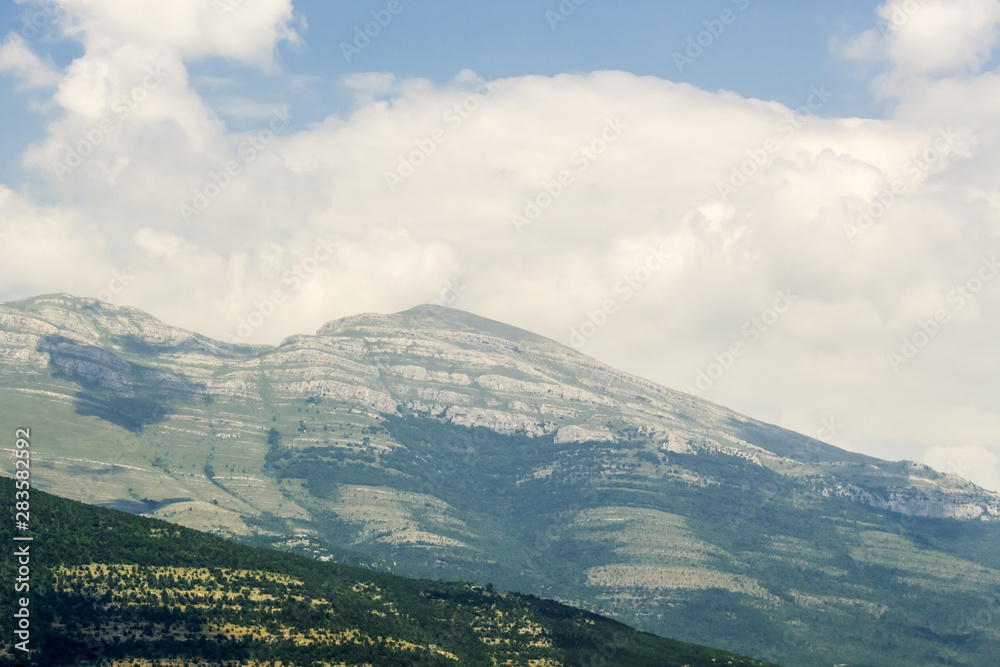 mountain landscape on sunny summer day. Montenegro, Albania, Dinaric Alps Balkan Peninsula. Сan be used for postcards, banners, posters, posters, flyers, cards
