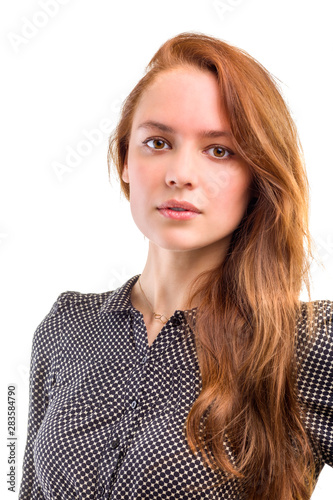 Portrait of a confident young female isolated white background © Igor Borodin