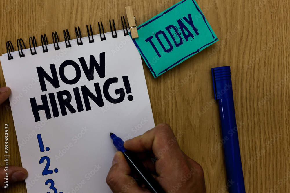Word writing text Now Hiring. Business concept for announcing that certain company seeking for new talents Man holding marker notebook clothespin reminder wooden table cup coffee Word writing text Now Hiring. Business concept for announcing that certain company seeking for new talents Man holding marker notebook clothespin reminder wooden table cup coffee