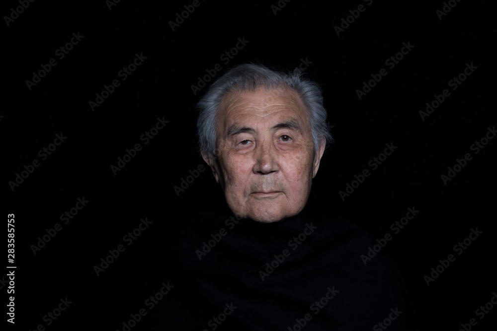 old man's face isolated on black background old man's face isolated on black background