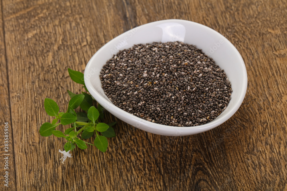 Dietary Chia seeds in the bowl Dietary Chia seeds in the bowl