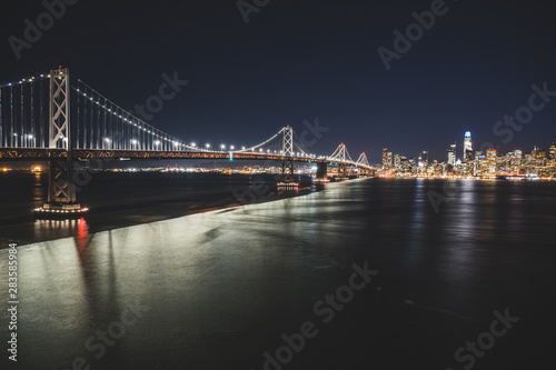 Panoramic beautiful scenic view of the Oakland Bay Bridge and the San Francisco city in the evening  California