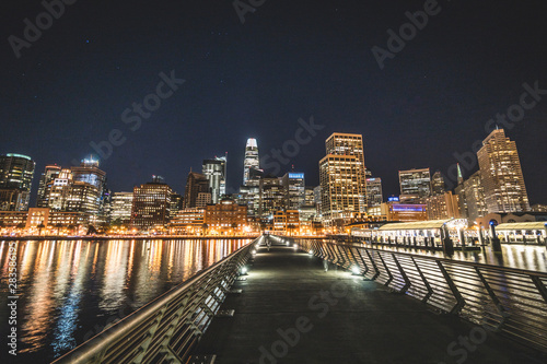 Panoramic beautiful scenic view of the San Francisco city and Financial City skyscraper buildings in the evening from pier 14, California