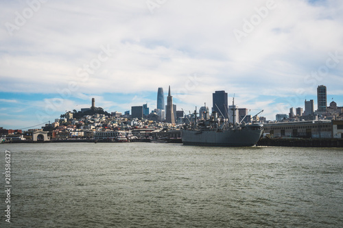 Panoramic symbolic view of San Francisco city from a boat tour on a sunny day with clear blue skies, California, USA