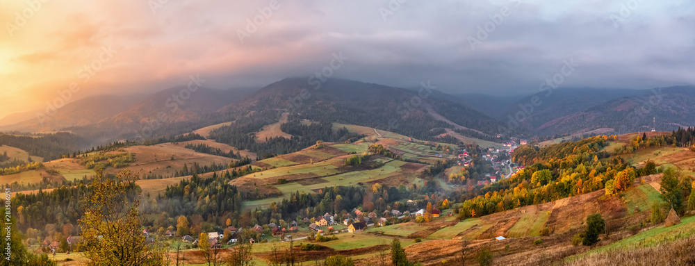 Colorful autumn panorama landscape in the mountain village