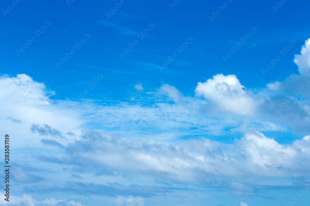 Fototapeta premium blue sky background with tiny clouds