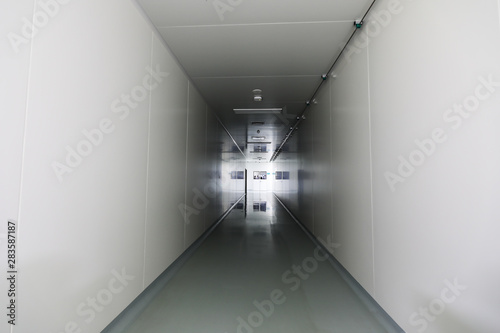 Tunnel white corridor of laboratory.