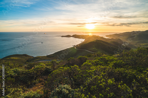 Beautiful scenic sunset view over Marin Headlands and the Pacific Ocean near San Francisco, California, USA photo