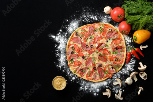 Italian pizza, pizza ingredients, tomatoes and mushrooms